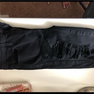High rise black distressed jeans!